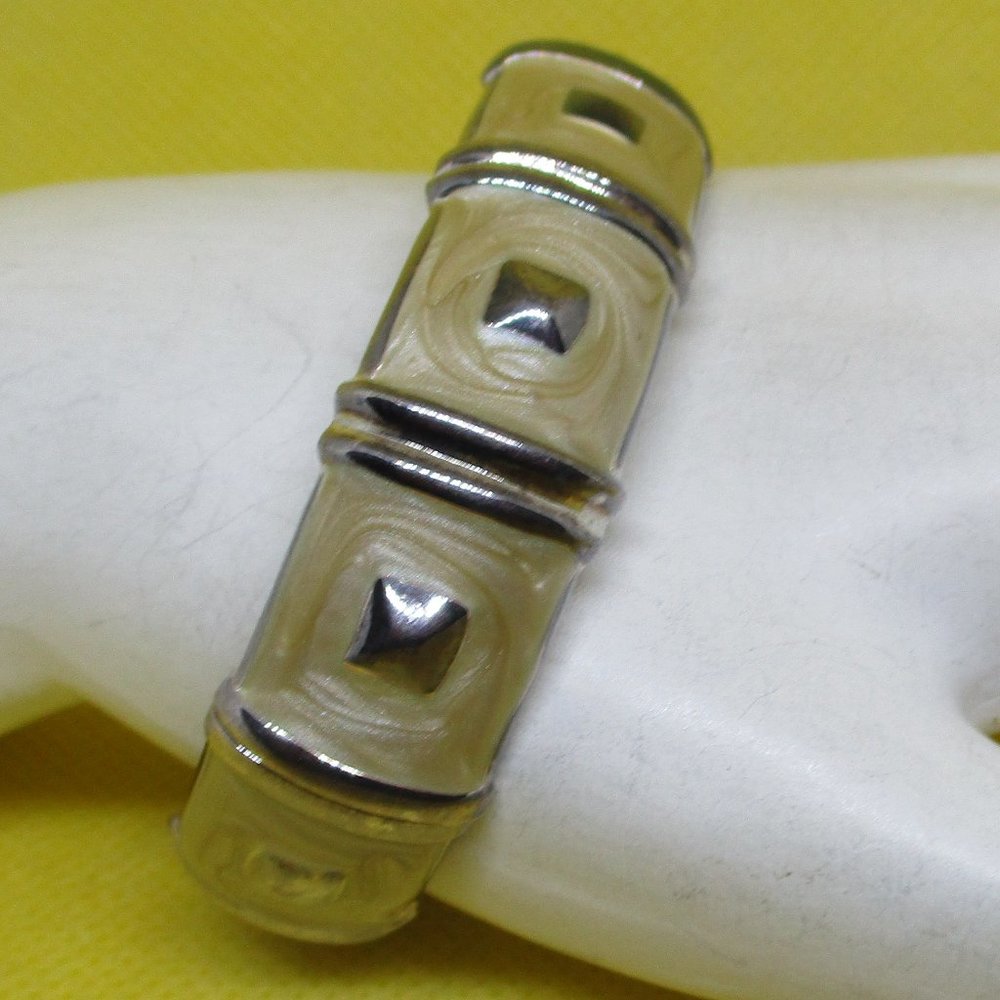 JOAN RIVERS BRACELET Hinged Clamper Bracelet Swirled Cream Colored Enamel Silver